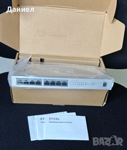 8 портов гигабитов PoE+ суич Zyxel GS1008HP, снимка 3 - Суичове - 50979485