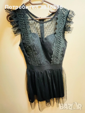 Елегантна дамска рокля в черен цвят, подходяща за размер XS/S. Без забележка!