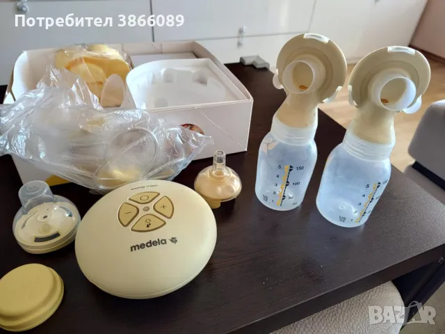 Двойна двуфазна помпа за кърма Medela swing & calma, снимка 3 - Помпи за кърма - 49074342