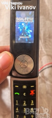 Самсунг f210