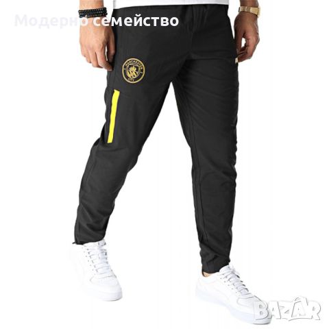 Мъжко спортно долнище puma x manchester city fc woven pants black yellow, снимка 1 - Спортни дрехи, екипи - 46797556