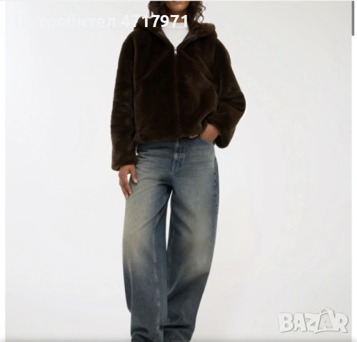 Пухено якенце за зимата в кафяв цвят. Подходящо за студените дни.