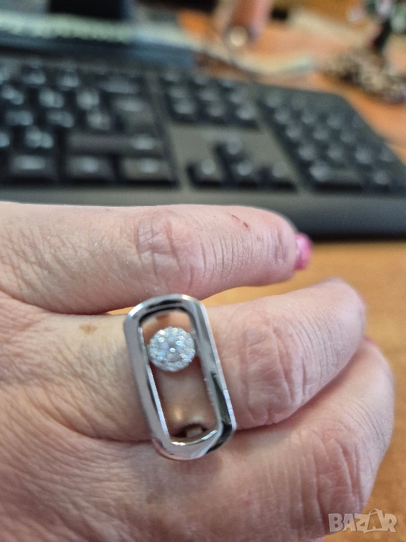 среб пръстен с подвижен циркон, снимка 1