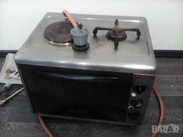 Печка   на   газ  и  ток   .