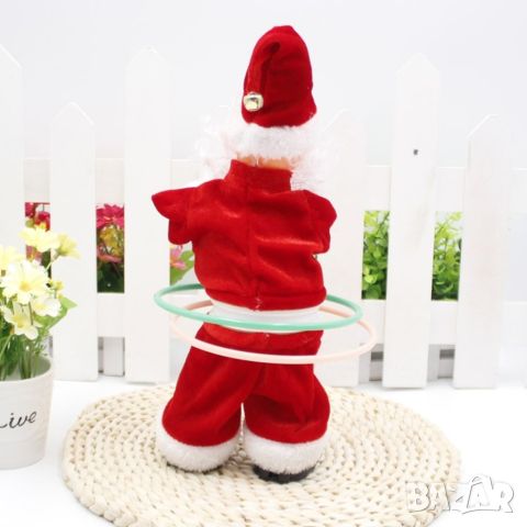Музикален Дядо Коледа, въртящ обръчи, 30см, снимка 5 - Музикални играчки - 46434251