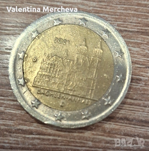 Монета от 2 евро с дефект