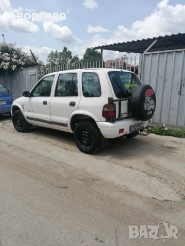 Kia Sportage - 2.0 газ / бензин, снимка 9 - Автомобили и джипове - 50507666