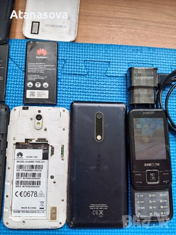 Телефони за части