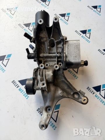 06L903143D стойка за компресор маслен филтър и охладител от Vw Golf R 4motion 2018г, двигател CJX 2.