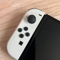  КАТО НОВ Nintendo Switch OLED - White + калъф+ игра GTA (trilogy), снимка 10 - Nintendo конзоли - 45462957