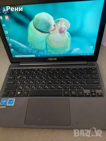 Лаптоп ASUS E203N, снимка 3 - Лаптопи за дома - 52965773