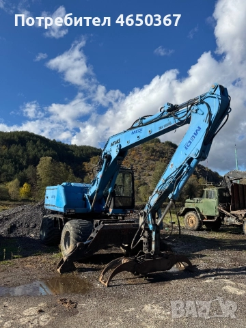 Колесен багер Atlas