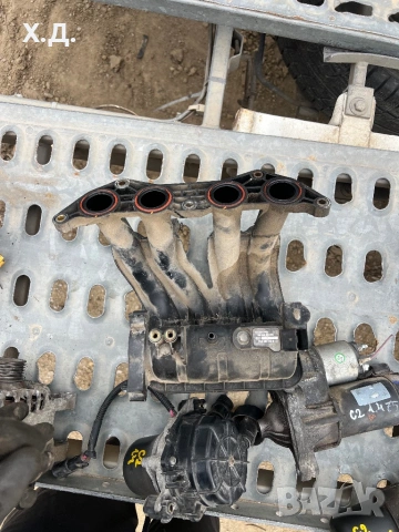 Всмукателен колектор Ситроен Ц2 1.4i 75кс 2003г, снимка 3 - Части - 54276255