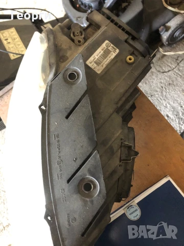 Оригинален десен фар VW Passat B6 Bi-Xenon цена 250лв, снимка 2 - Части - 50995716