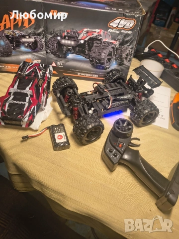 Кола с дистанционно управление 40 км/ч, мащаб 1:18 за офроуд с радиоуправляеми двигатели , снимка 3 - Кукли - 53353157