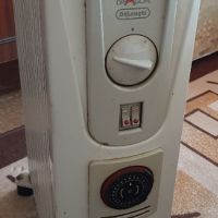 Маслен радиатор Delonghi, снимка 1 - Отоплителни печки - 45147918