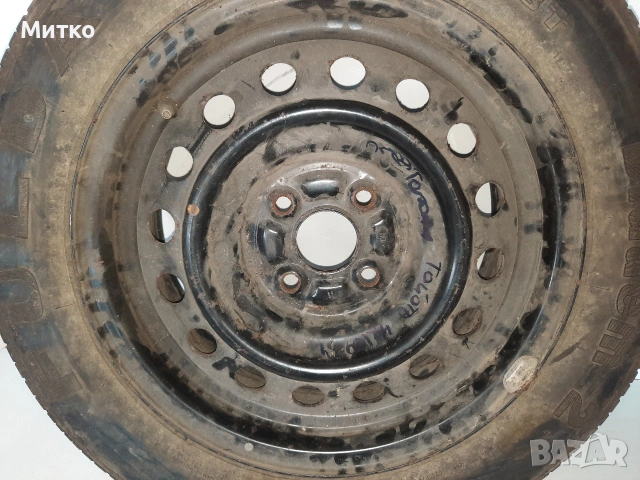 Желязна джанта с гума 15 ка за Тойота Ярис или Корола с 4 дупки, снимка 2 - Гуми и джанти - 53738925