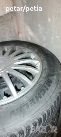 Зимни гуми със джанти Opel Astra 195/65/15, снимка 8 - Гуми и джанти - 52592861
