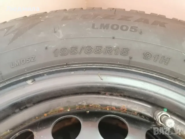 Четири летни гуми с джанти 195/65 R 15, снимка 2 - Гуми и джанти - 43307626