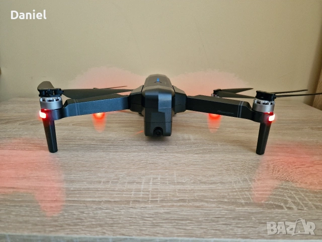 Дрон SJRC F11 пълен комплект + нова батерия, снимка 3 - Дронове и аксесоари - 53611832