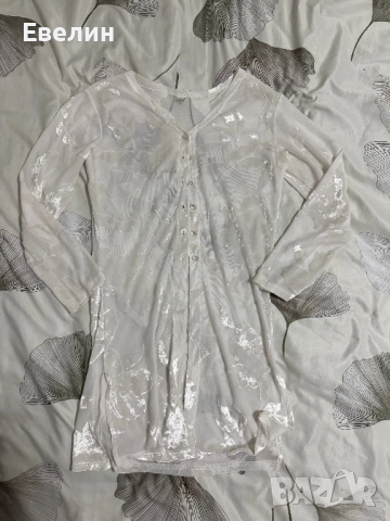 Бяла жилетка