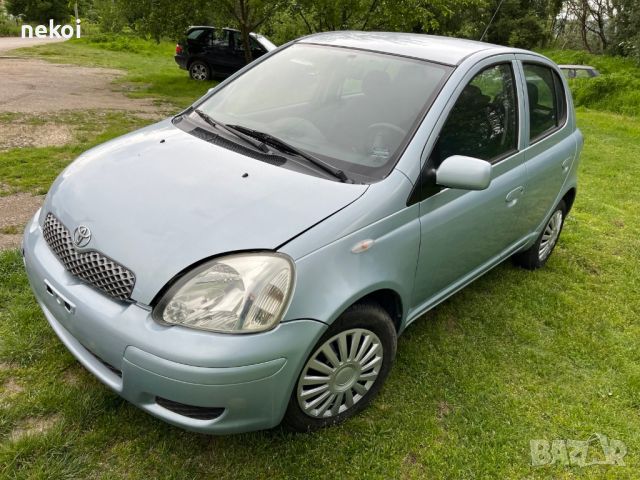 Продавам Toyota Yaris 2004г Сив, снимка 11 - Автомобили и джипове - 46209377