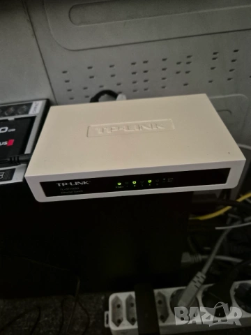 TP-Link TL-SF1005D - Суич, комутатор