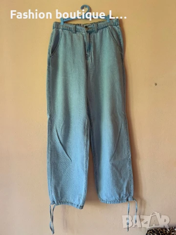 Дънки с широк прав крачол и връзки на глезените със странични джобове 38 размер на марката Amisu 👖