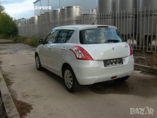 Suzuki Swift 1.3DDIS-ПЕРЛА, снимка 6 - Автомобили и джипове - 47490771