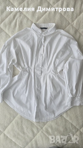 Бяла риза с интересна кройка – тренди модел