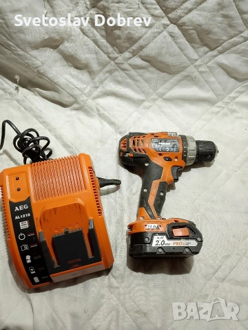 акумулаторен винтоверт AEG 14.4v комплект зарядно и батерия