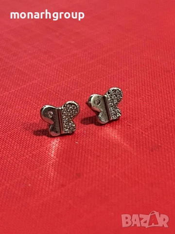 Сребърни обеци /едната е без щифт/