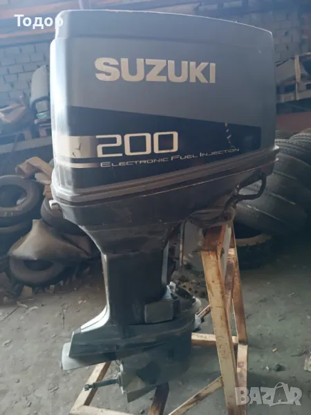 Продавам извънб. д-л SUZUKI 200HP, внос от Италия,  работещ, със спукано торпедо. Може и за части., снимка 1