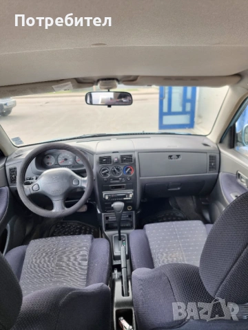 Daihatsu Sirion, снимка 11 - Автомобили и джипове - 54244160