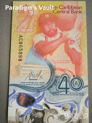 Банкнота - Източни Кариби - 2 долара (юбилейна) UNC | 2023г., снимка 3 - Нумизматика и бонистика - 45694063