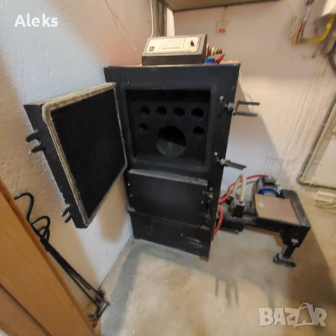 Котел на пелети (Италия) – 32 kW, ползван 4 сезона, снимка 4 - Отоплителни печки - 52988139