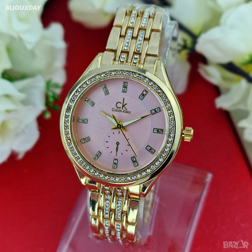 водоустойчив дамски часовник calvin klein с розов циферблат от медицинска стомана, снимка 1