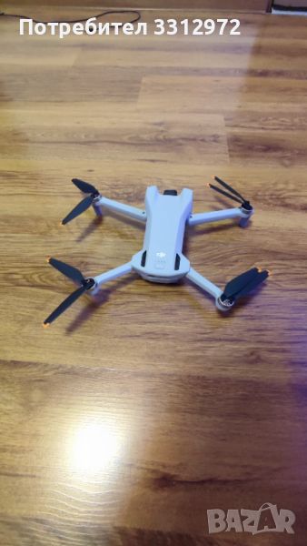 DJI MINI 3 (RC) + Чанта и батерияд, снимка 1