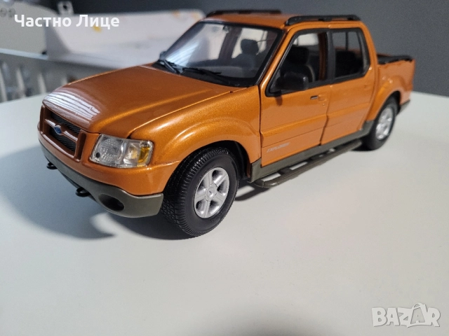 Модел Ford Explorer Sport Trac Orange Maisto 1/18 , снимка 14 - Коли, камиони, мотори, писти - 52344129