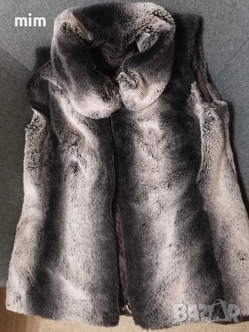 Пухен елек със цип