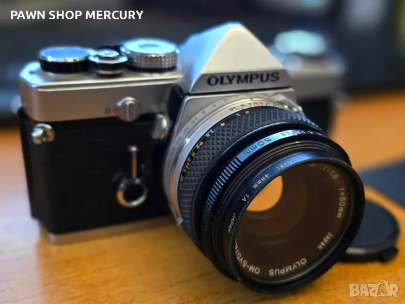 Продавам лентов фотоапарат OLYMPUS OM-1n, снимка 1