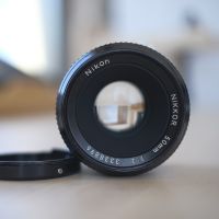 Nikon Nikkor 50mm f2 ръчнофокусен твърд обектив, снимка 1 - Обективи и филтри - 45289511