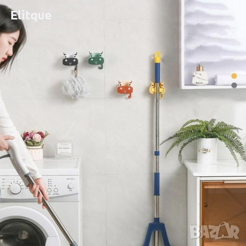 Многофункционална стенна поставка за мопове и метли във форма на крава. Цвят: според наличността