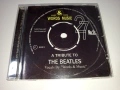 Компакт диск A Tribute To The Beatles", изпълнен от "Words & Music". , снимка 1