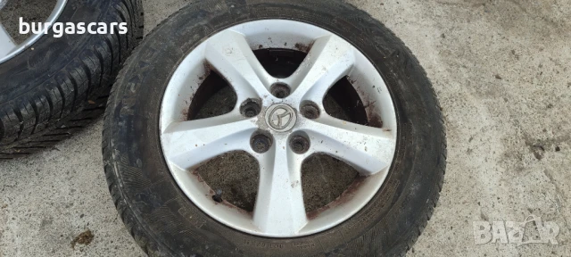 Алуминиеви джанти 15ки Mazda 3 - 200лв, снимка 2 - Гуми и джанти - 51214982