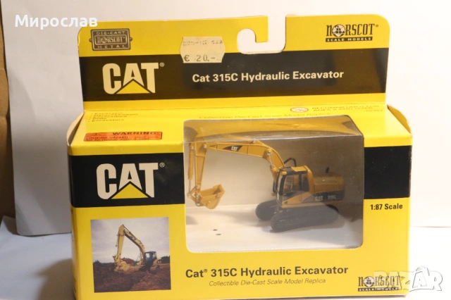 CAT 1/87 H0 ТРАКТОР БАГЕР ФАДРОМА ТОВАРАЧ КОЛИЧКА МОДЕЛ