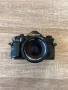 Canon A-1 с обектив Canon lens fd 50mm 1:1,4 S.S.C, снимка 1
