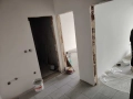 one-bedroom apartment with a finished bathroom and flooring., снимка 3