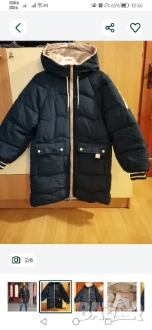 Тъмно синьо дамско яке. По етикет XXL, но отговаря на 42Л размер.