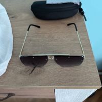 Слънчеви очила, снимка 2 - Слънчеви и диоптрични очила - 45891058